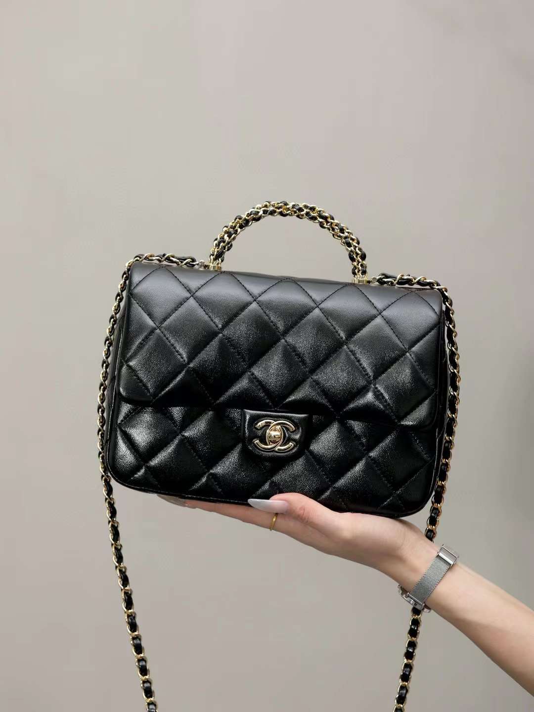 Chanel mouth cover with handle view 1
