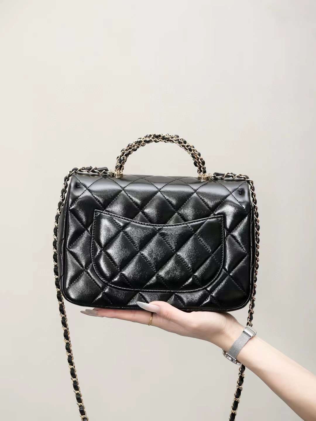 Chanel mouth cover with handle view 2