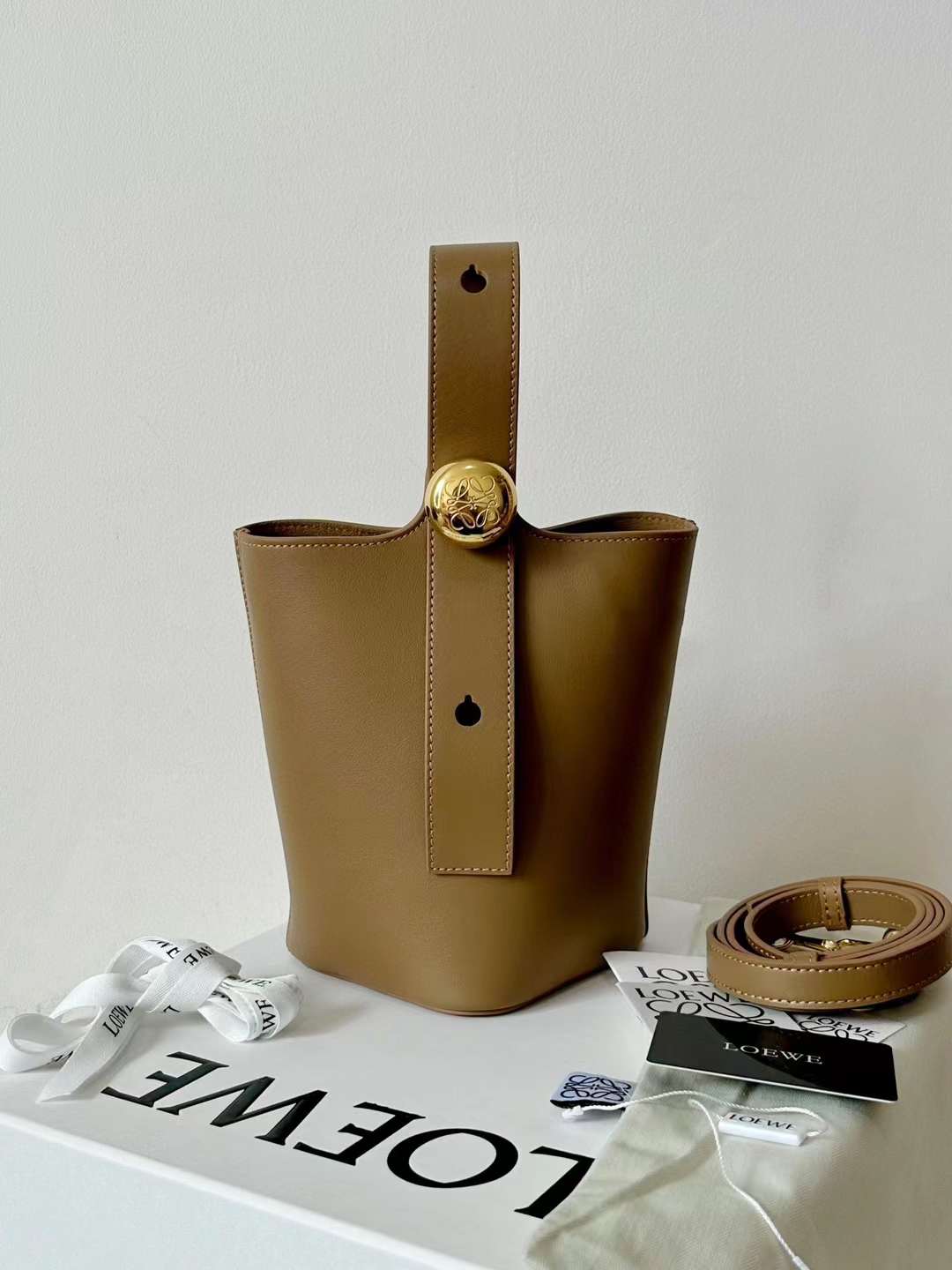 Loewe pebble mini bucket bag view 1