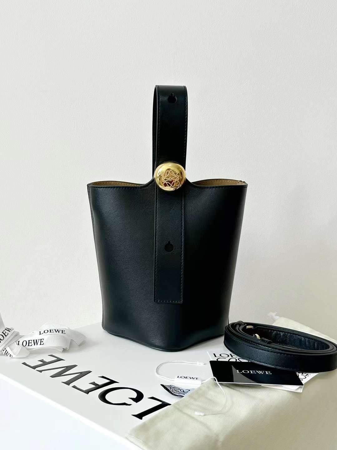 Loewe pebble mini bucket bag view 4