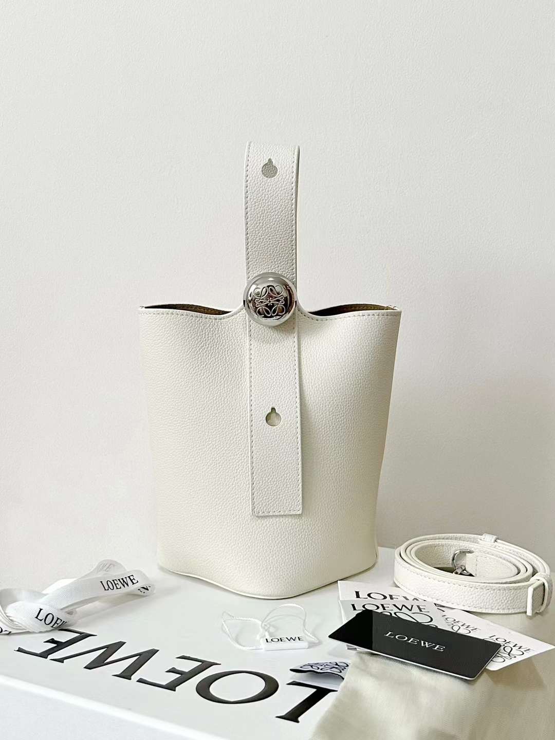 Loewe pebble mini bucket bag view 1
