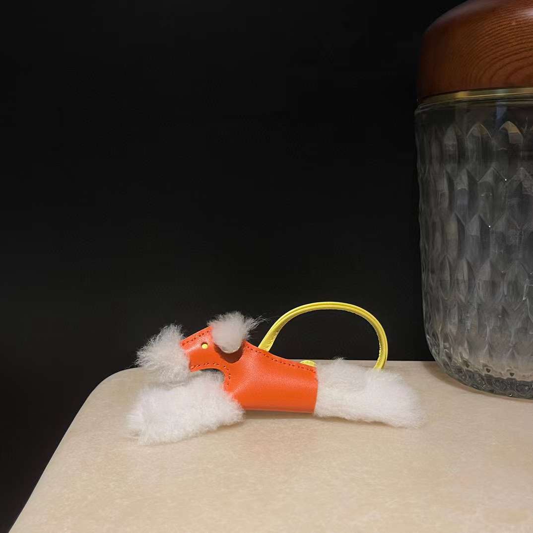 Hermès Budy puppy pendant view 1