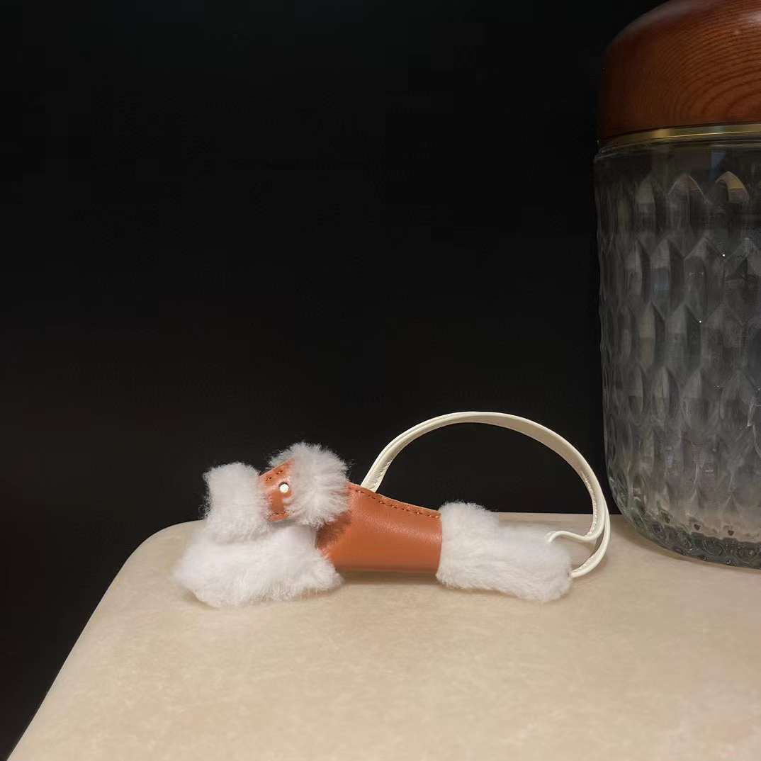 Hermès Budy puppy pendant view 17