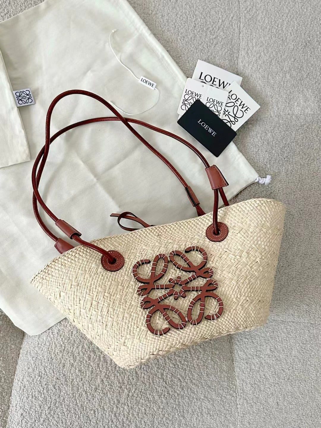 Loewe Anagram Basket Bag in iraca palm and calfskin view 1