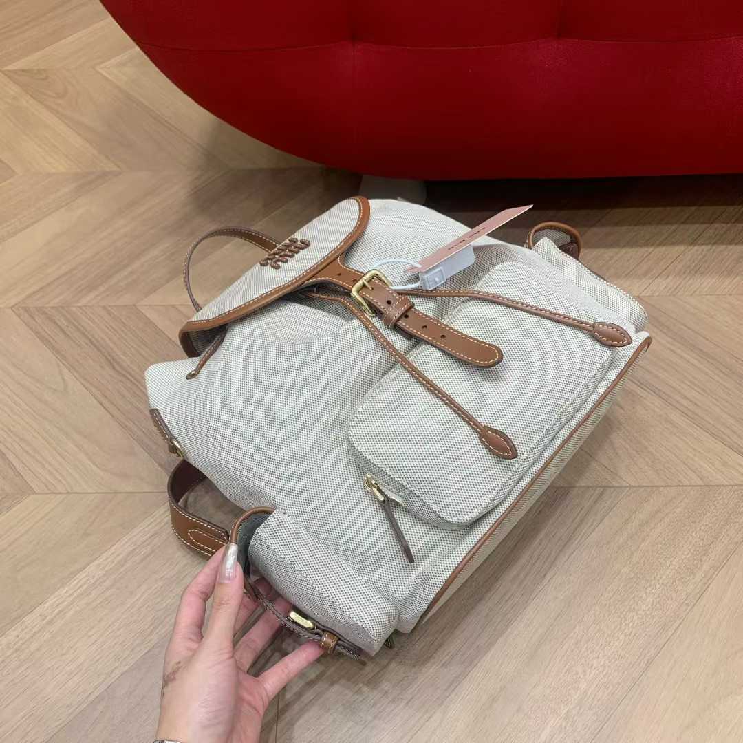 Miu Miu Canvas and leather backpack view 3
