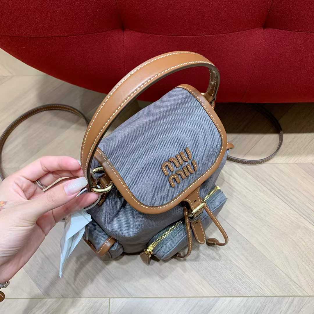 Miu Miu Canvas and leather backpack view 3