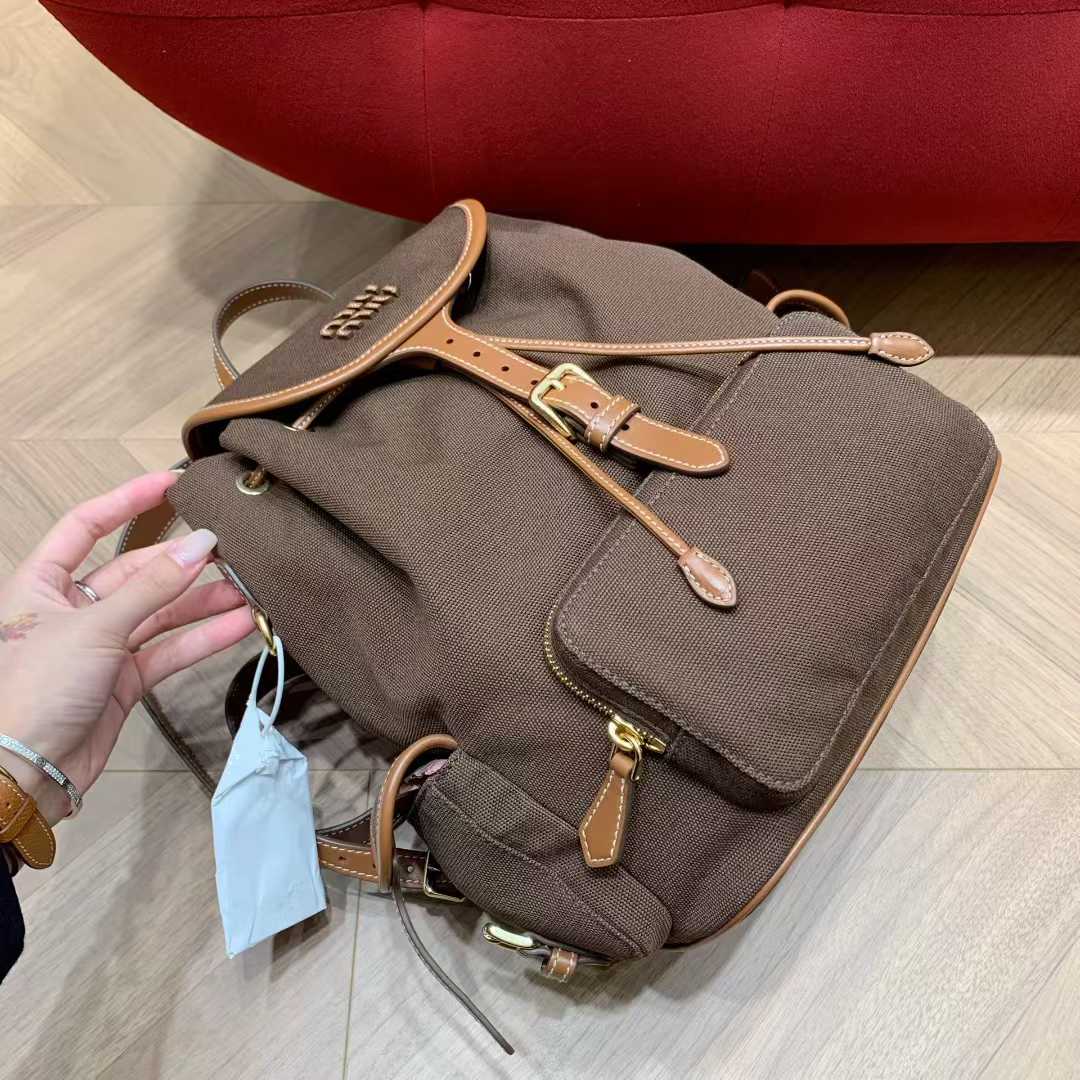 Miu Miu Canvas and leather backpack view 3