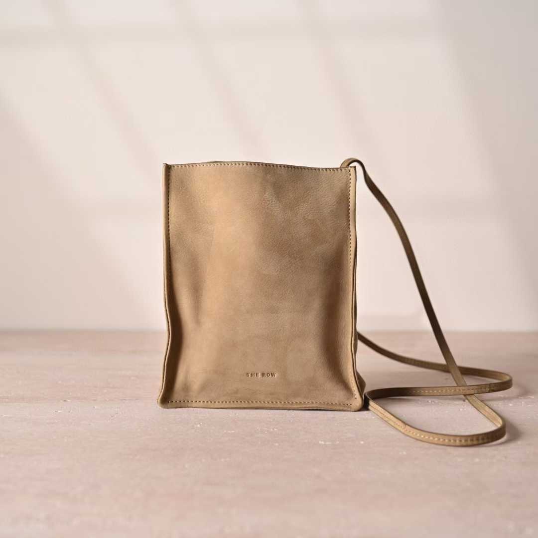 The Row To Go Tote Front suede view 1