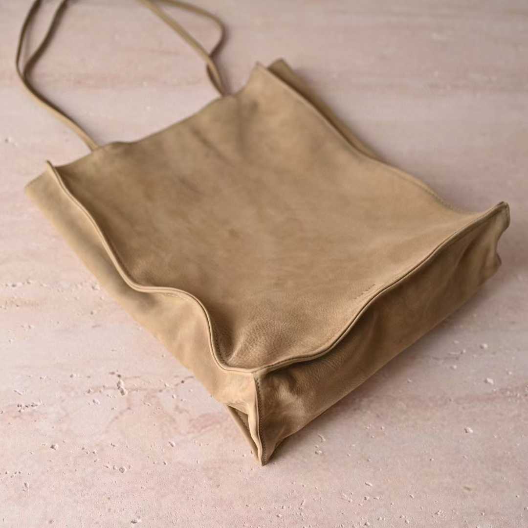 The Row To Go Tote Front suede view 11