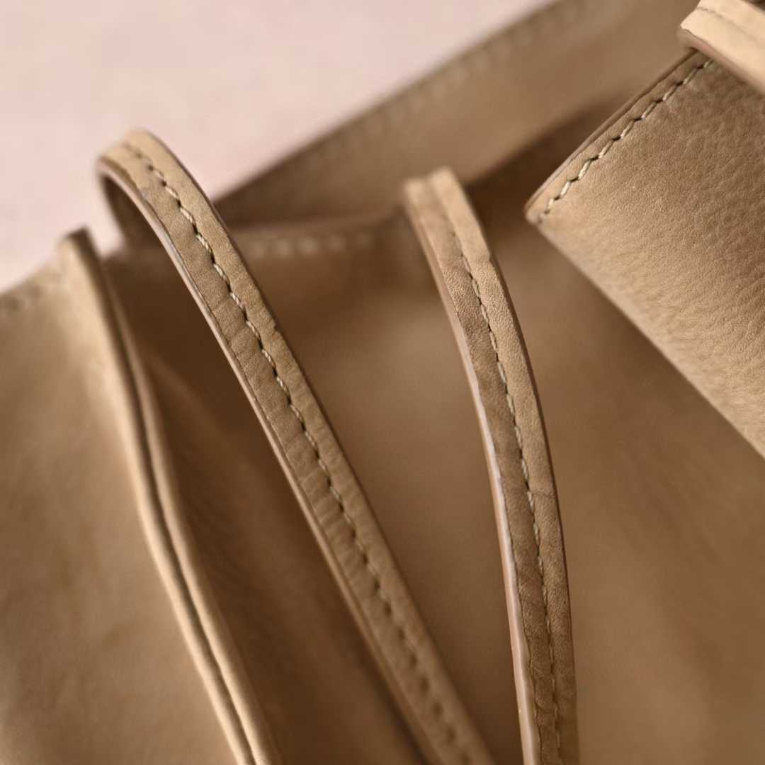 The Row To Go Tote Front suede view 15
