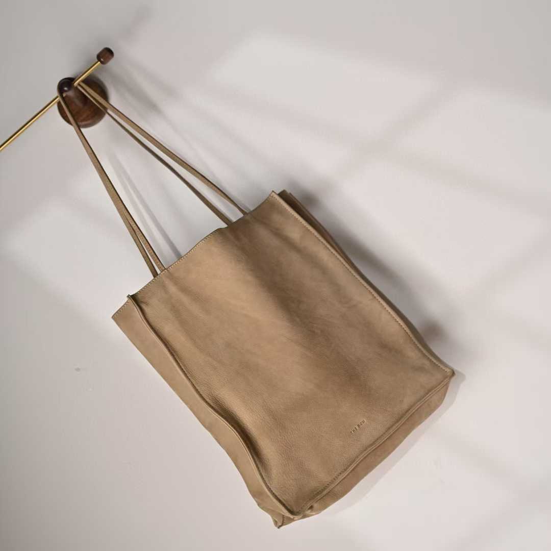 The Row To Go Tote Front suede view 17