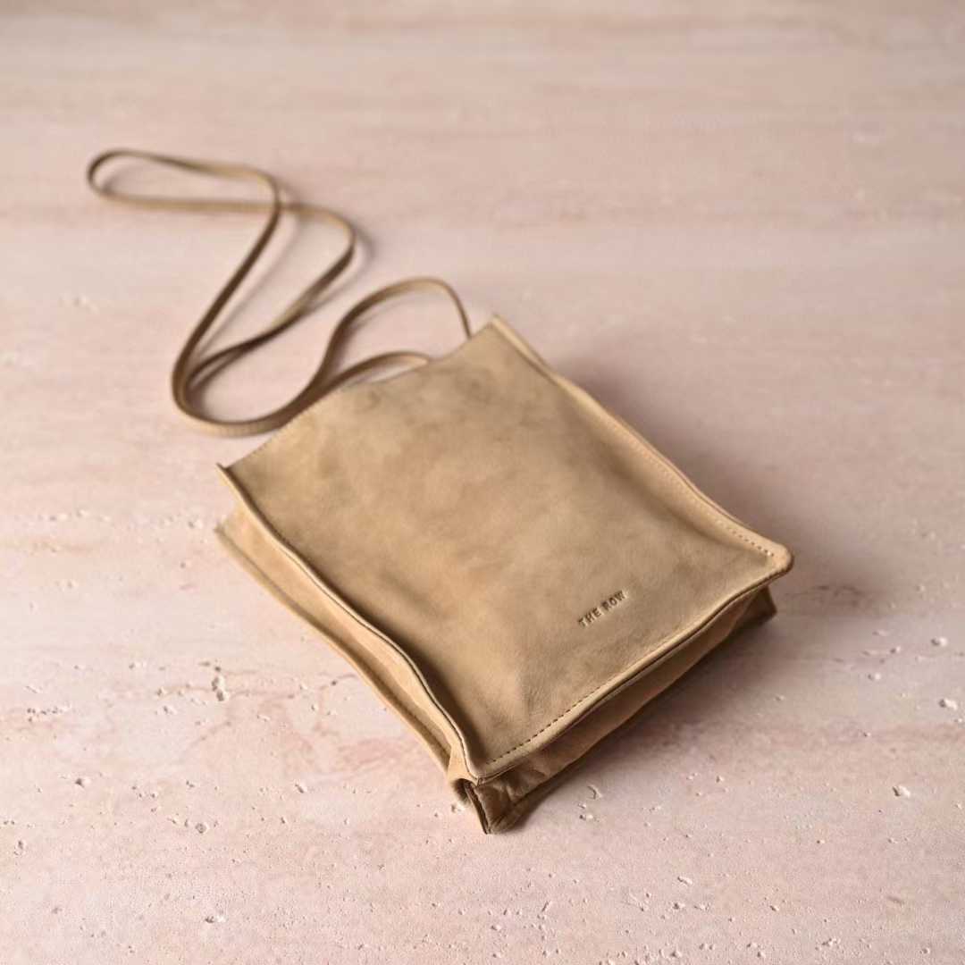 The Row To Go Tote Front suede view 2