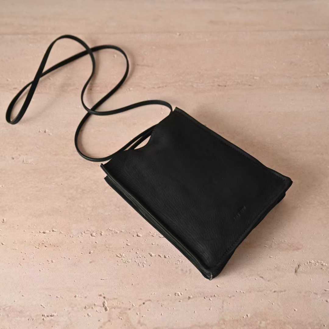 The Row To Go Tote Front suede view 21