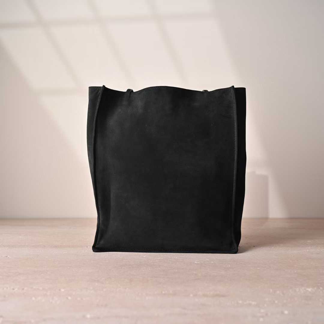The Row To Go Tote Front suede view 25