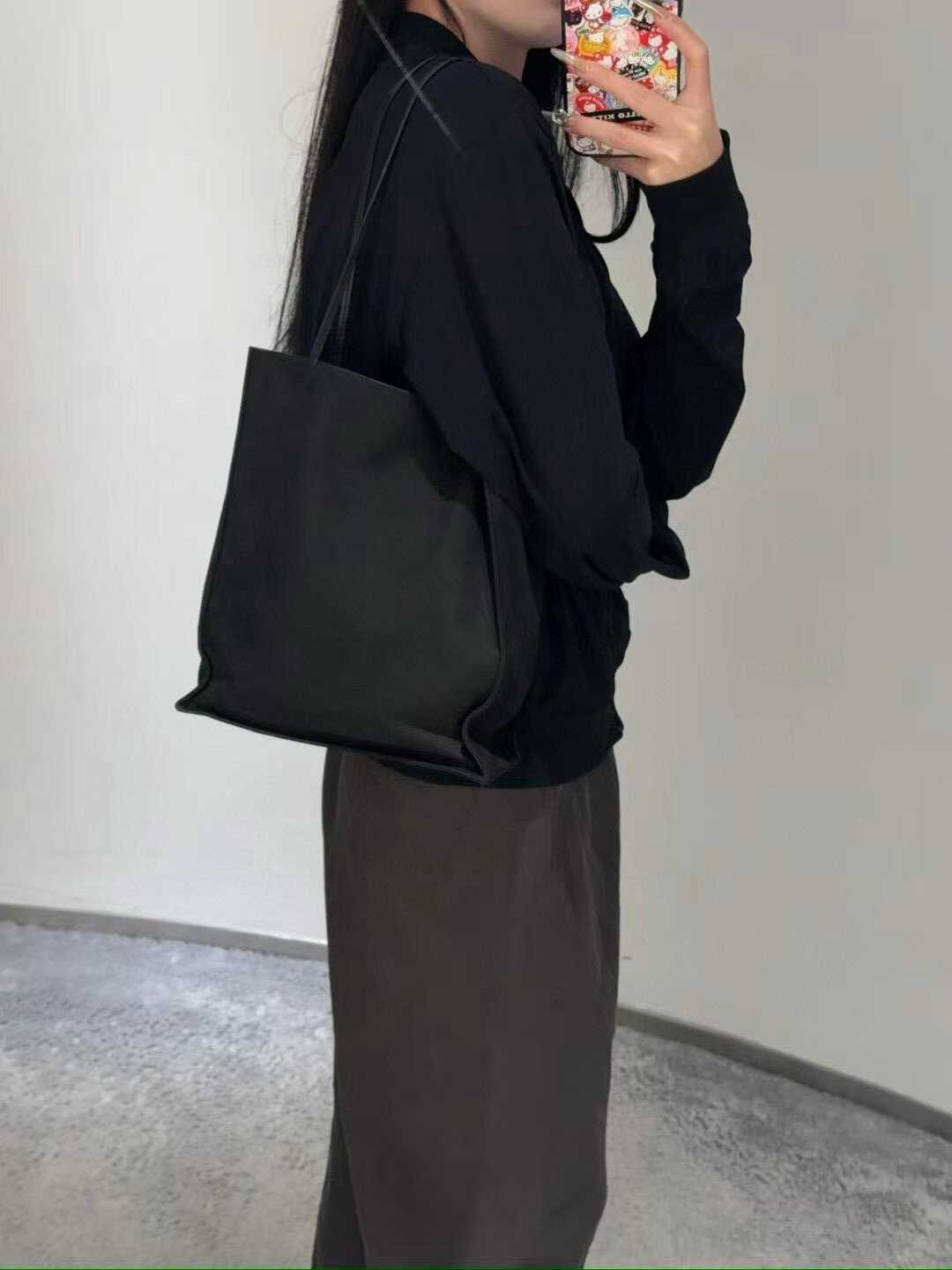 The Row To Go Tote Front suede view 26