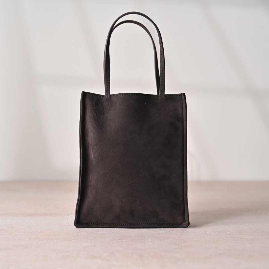 The Row To Go Tote Front suede view 27