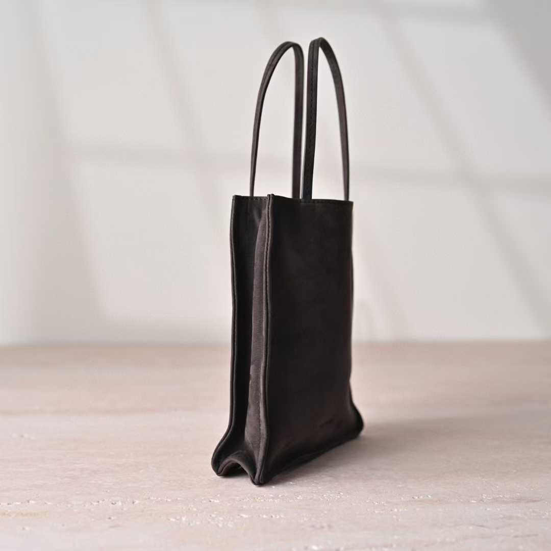The Row To Go Tote Front suede view 29