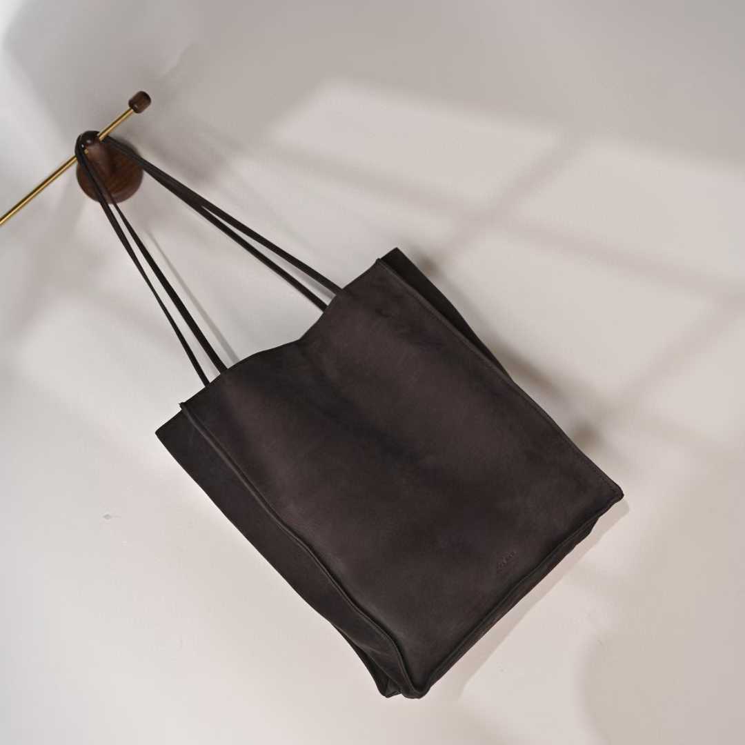 The Row To Go Tote Front suede view 33
