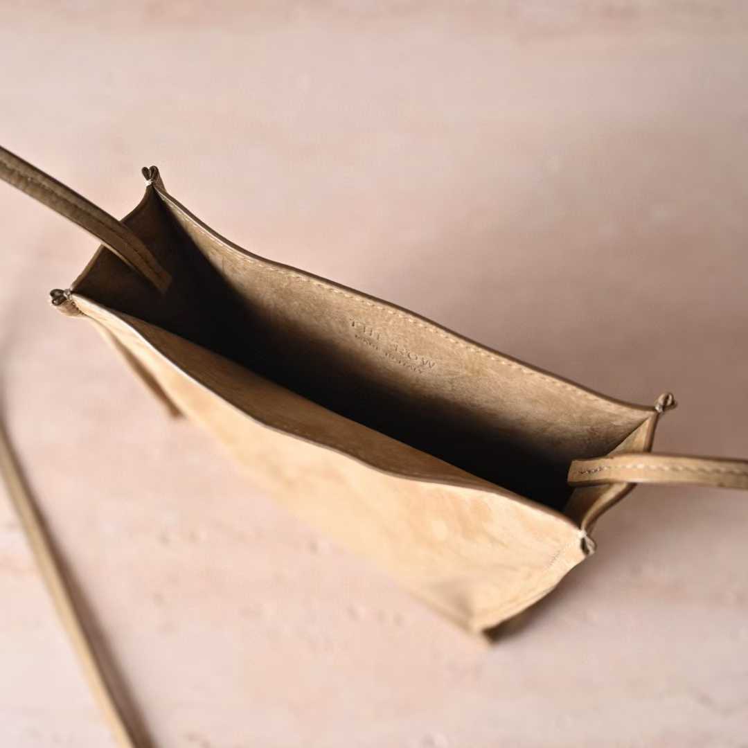 The Row To Go Tote Front suede view 5
