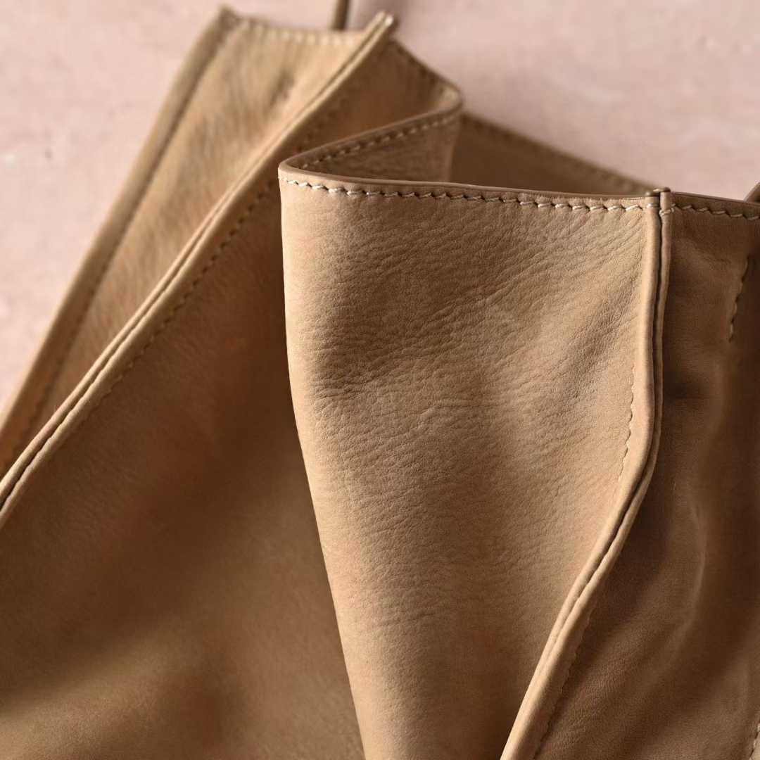 The Row To Go Tote Front suede view 7