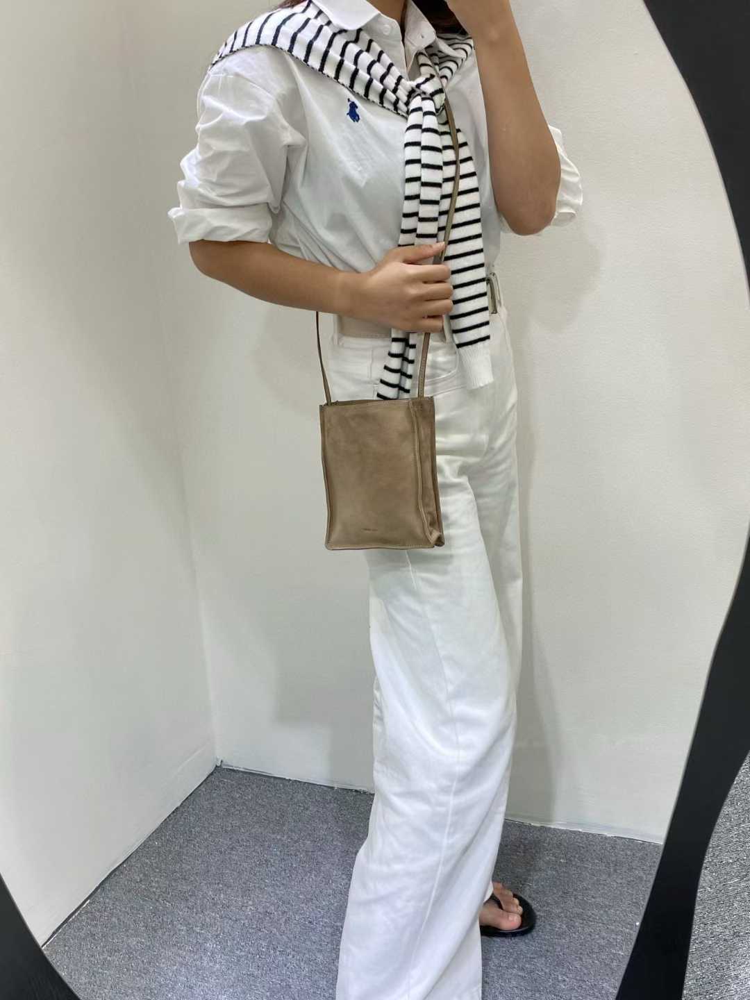 The Row To Go Tote Front suede view 9
