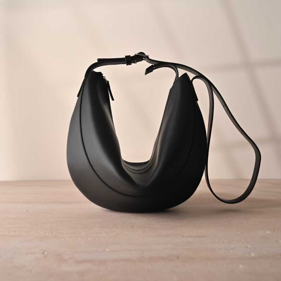 The Row Crossbody Crescent view 1