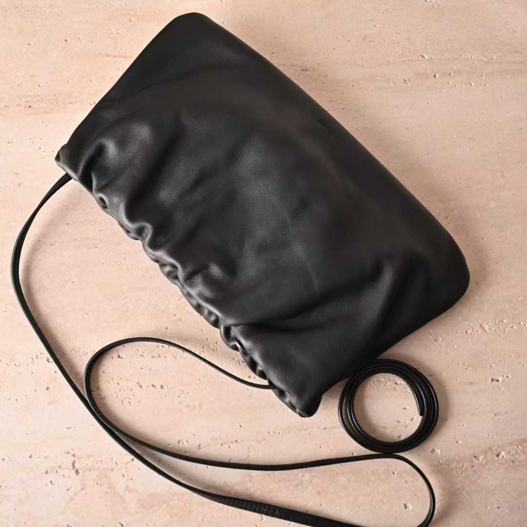 The Row Bourse Clutch Leather handbags view 2