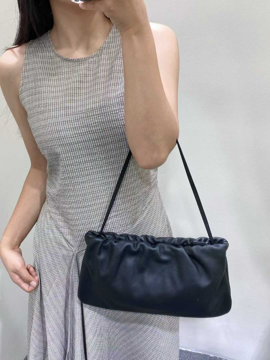 The Row Bourse Clutch Leather handbags view 9