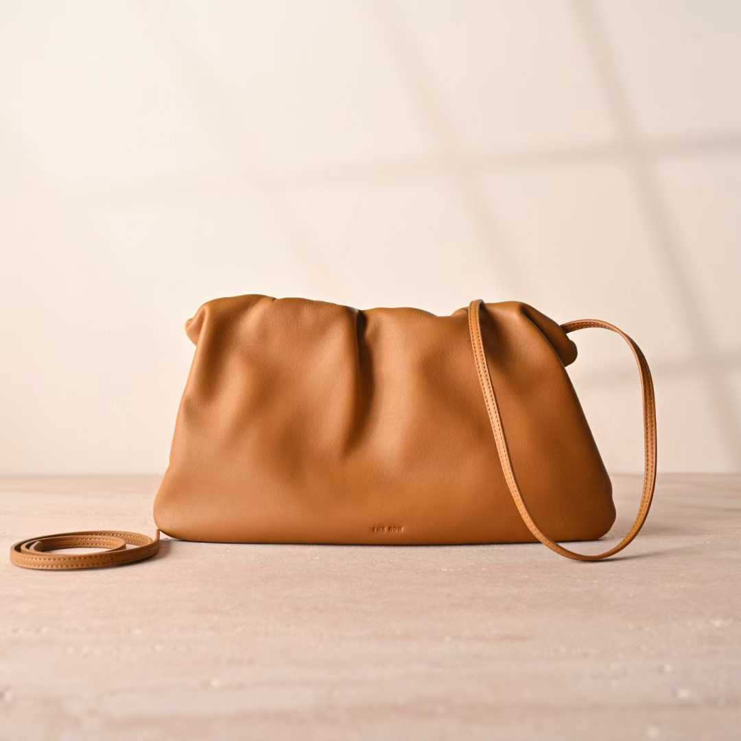 The Row Bourse Clutch Leather handbags view 1