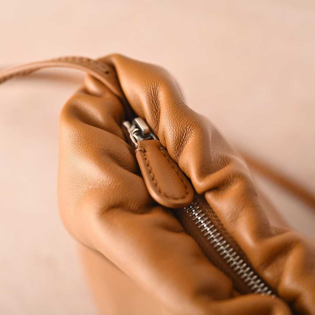 The Row Bourse Clutch Leather handbags view 4