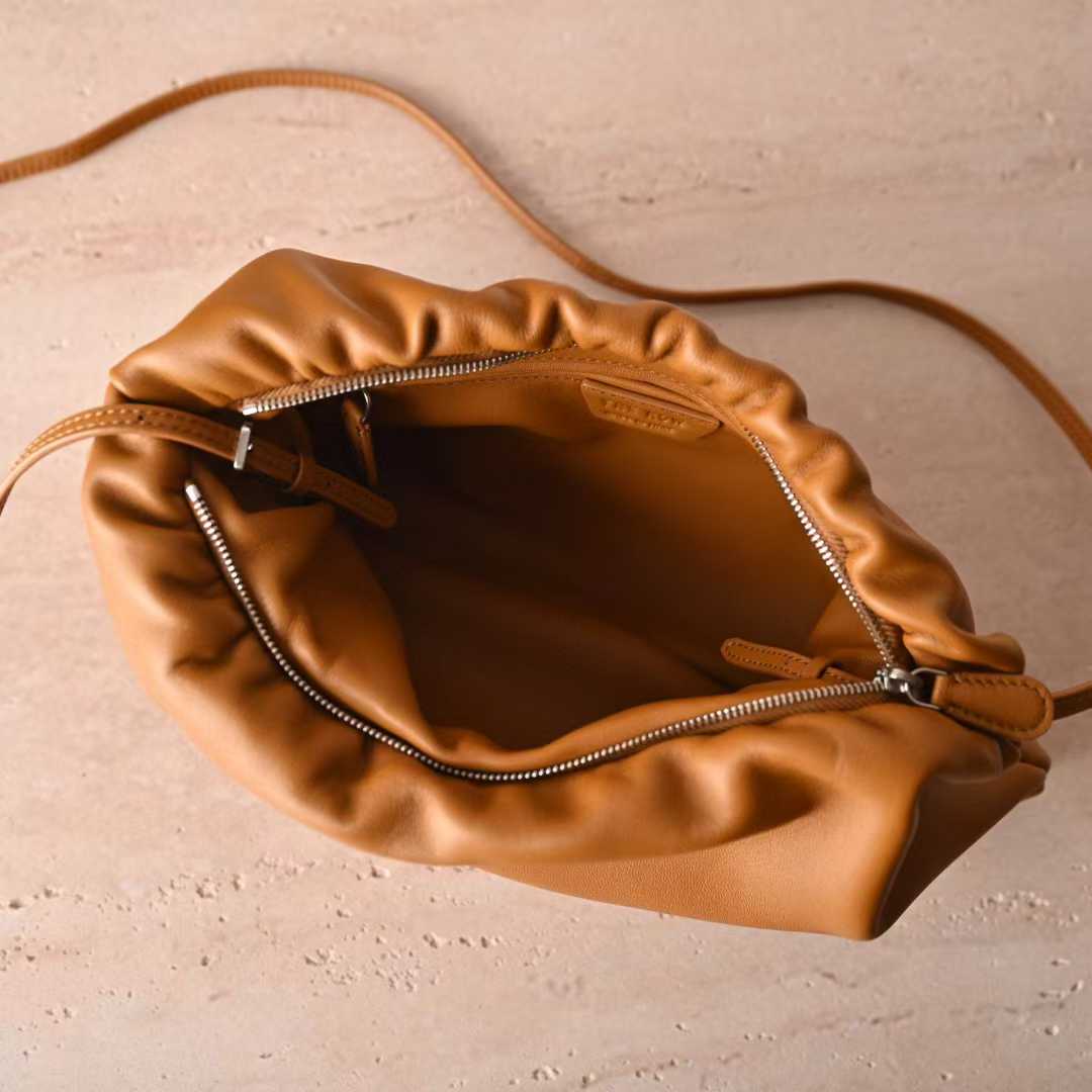 The Row Bourse Clutch Leather handbags view 5