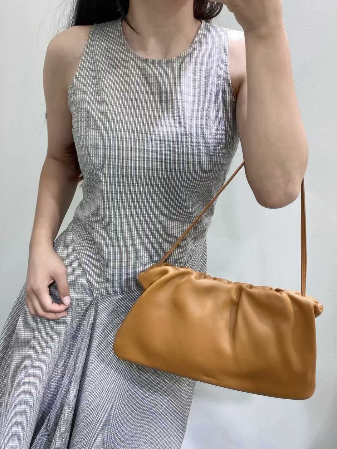 The Row Bourse Clutch Leather handbags view 9