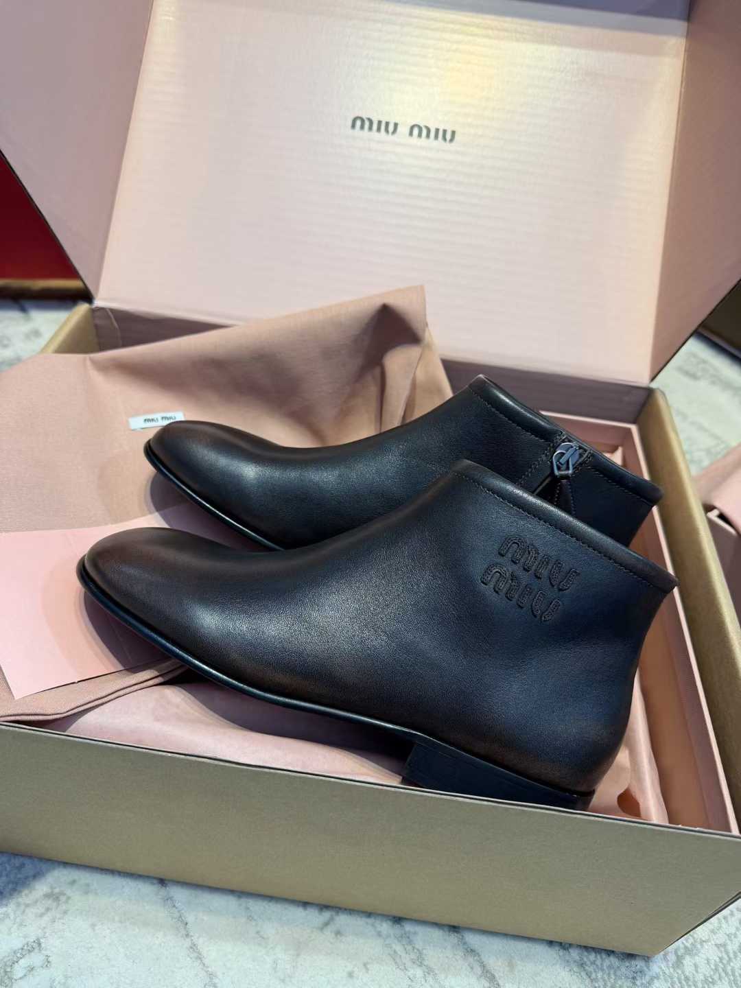Miu Miu Short boots view 1