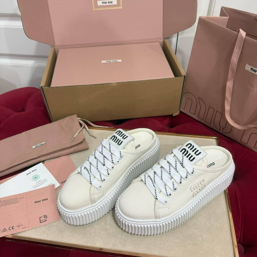 Miu Miu 2025 Platform canvas shoes view 5